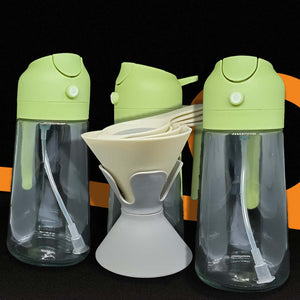 The Kooking Essential Bundle consists of three 2 in 1 oil dispenser and a free 6 in 1 funnel set placed in a black background